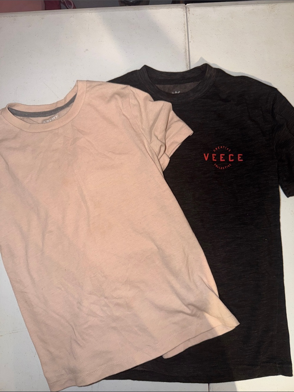 Buckle Kids Short Sleeve Tees in Beige and Black with Red Logo